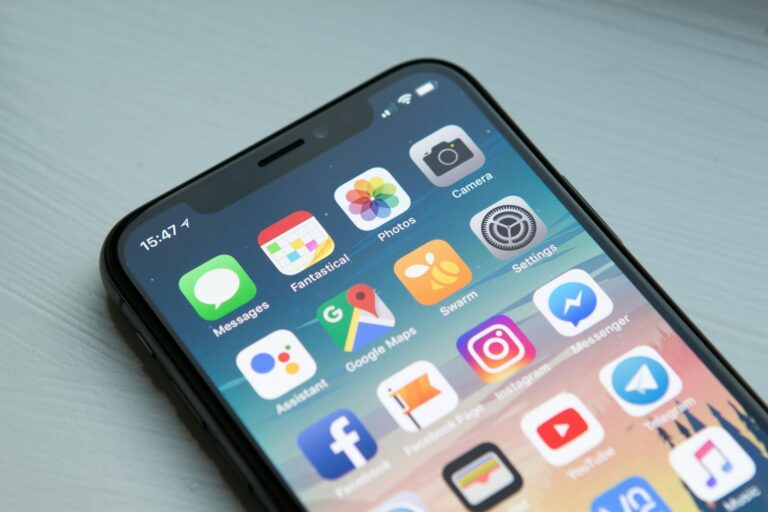 Smartphone home screen full of app icons
